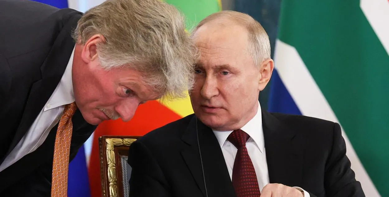 Прэс-сакратар Дзмітрый Пяскоў і прэзідэнт Расіі Уладзімір Пуцін
