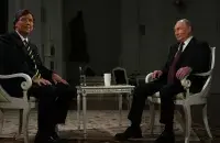 Такер Карлсан і Уладзімір Пуцін
