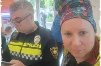 Марына Зялёная і грузінскі паліцыянт у банку
