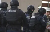 Alexandru Balan (right) was detained in Romania in September 2025
